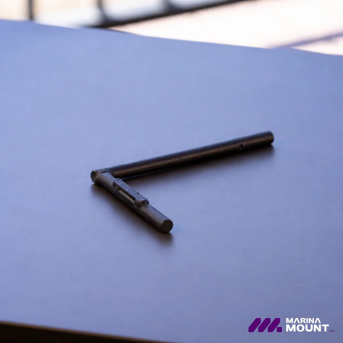Marina Mount ergonomic handle with removable locking pin for securing the dock mounting system