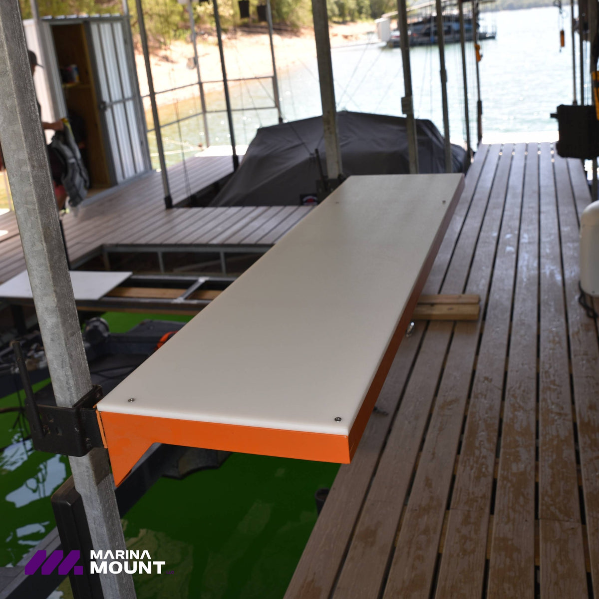 Marina Mount Table Attachment installed between two square uprights on a covered boat dock